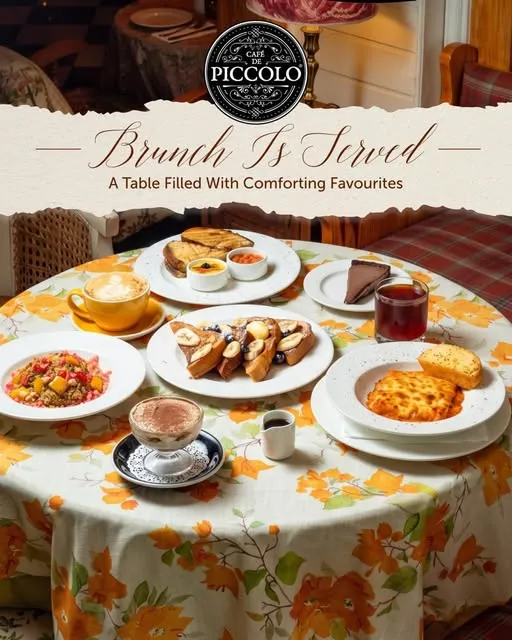 A post from Café De Piccolo headed Brunch Is Served: a table of brunch plates and a cappuccino on a floral cloth.