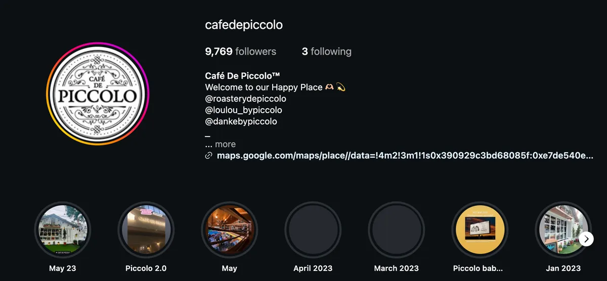 The Café De Piccolo Instagram profile: 9,769 followers, a bio that reads Welcome to our Happy Place and names the sister cafés, and story highlights.